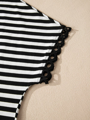 Classic striped t-shirt with black eyelet trim on the sleeve.