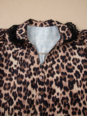 Women's leopard print button-up shirt with black lace collar detail.