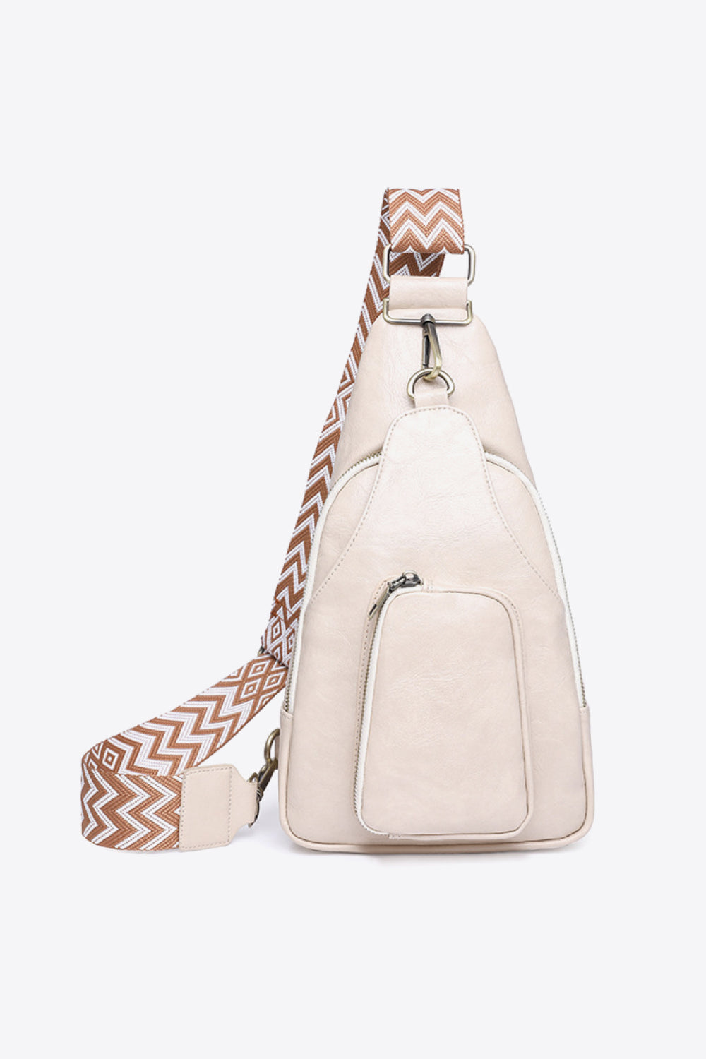 Ivory PU sling bag with a patterned strap and front zip pocket.