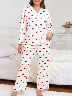 red pajama set featuring buttoned and heart-print