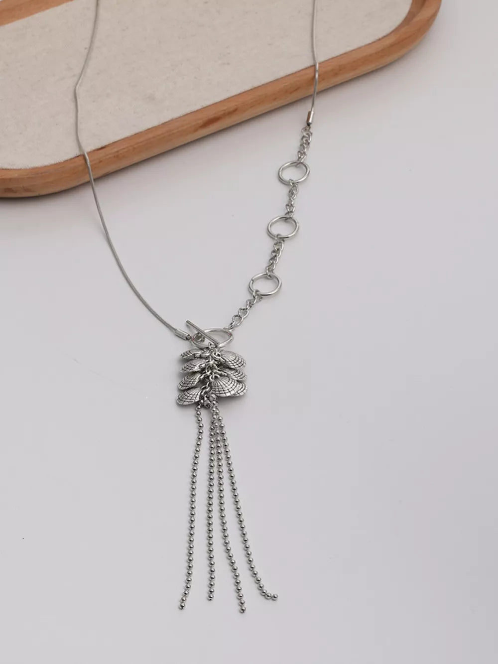 silver with necklace with leaf pendant