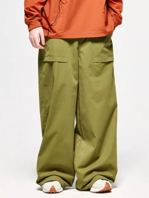 Relaxed fit cargo pants in yellow-green with two front flap pockets and a drawstring waist.