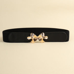 Black elasticated waist belt with gold bow clasp detail