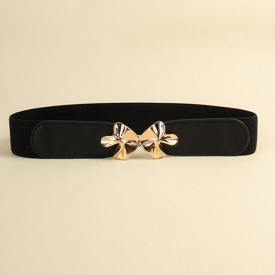Black elasticated waist belt with gold bow clasp detail