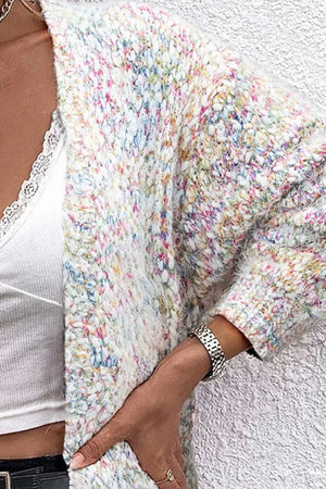Multicolor bouclé knit open cardigan with lace trim detail and long sleeves.