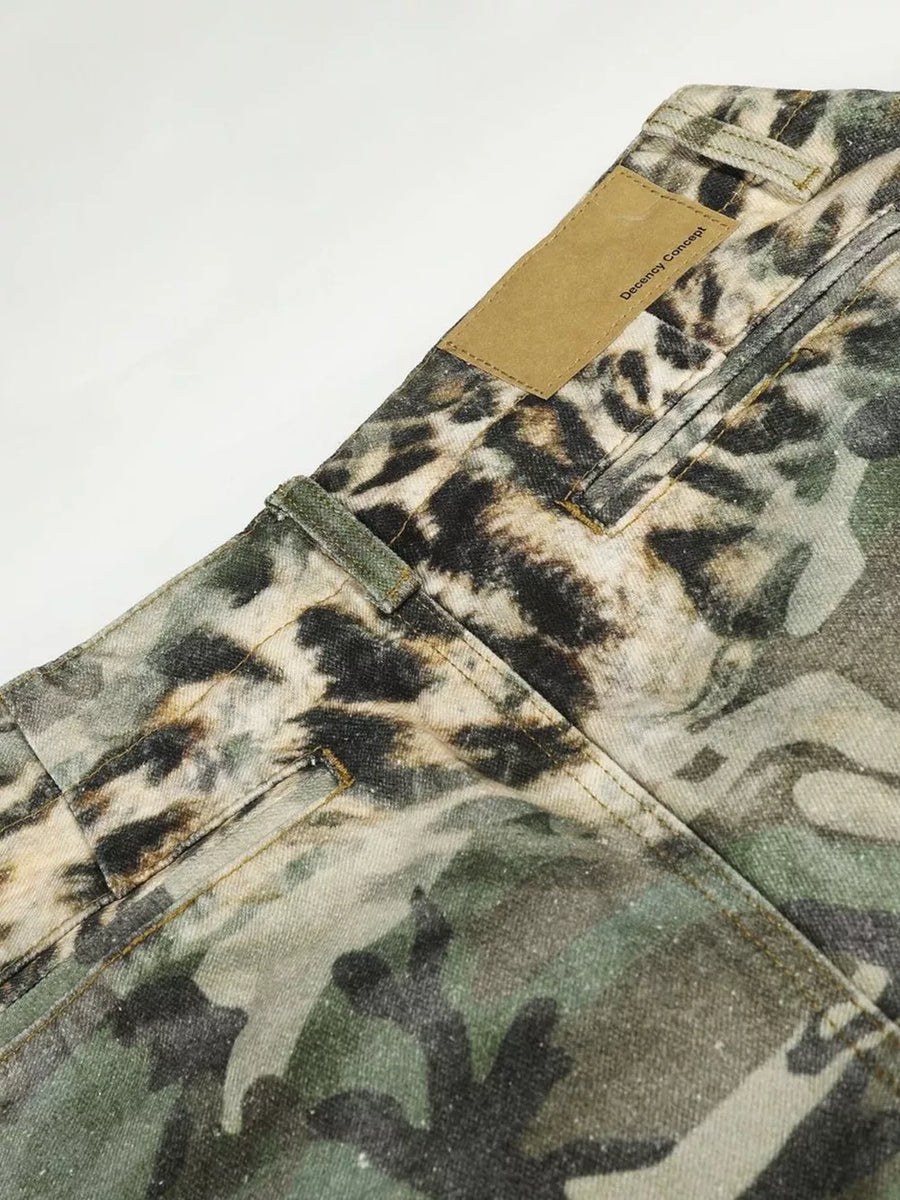 Maternity cargo capris with leopard and camouflage print, featuring a tan leather brand patch.