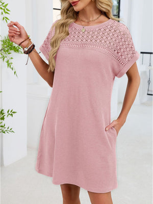 Blush pink t-shirt dress with short sleeves and sheer lace yoke detail.
