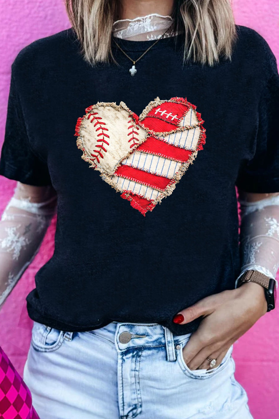 Black cotton t-shirt with distressed baseball heart graphic and lace sleeves.