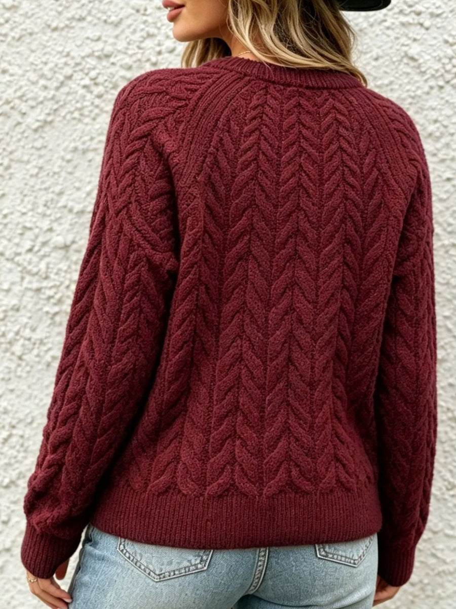 navy blue pullover sweater with decorative button and raglan sleeve