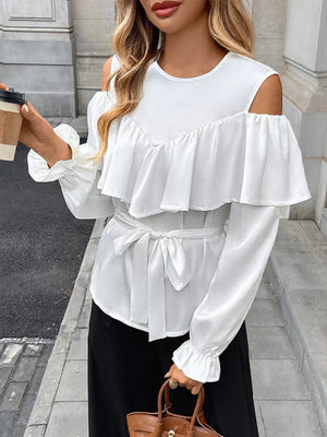 White ruffled cold shoulder maternity blouse with tie belt and bell sleeves.