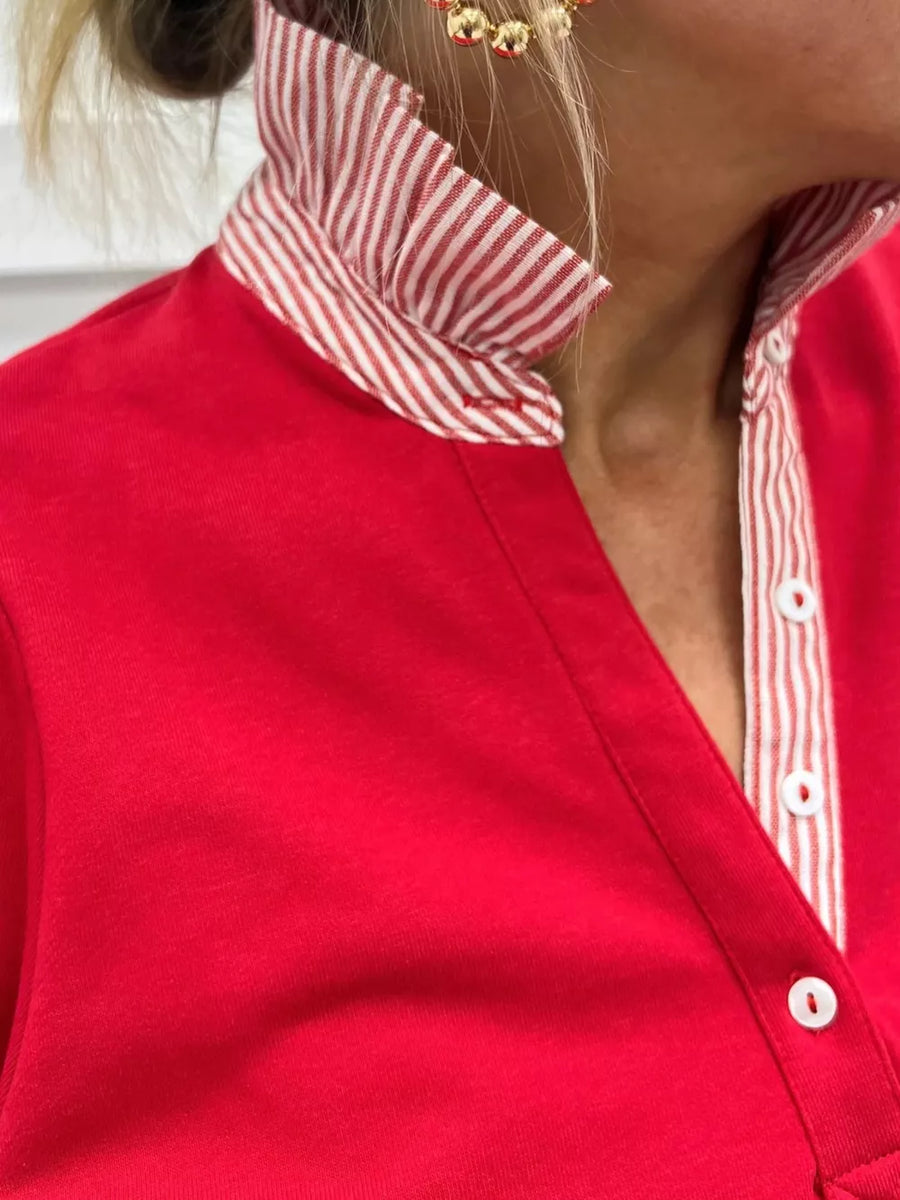 Red cotton blouse with striped collar and button placket detail