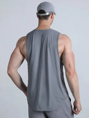 Gray performance cut tank top with curved hem and logo detail on back.