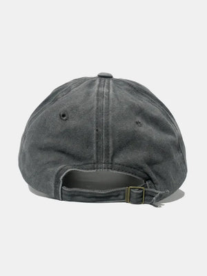 Gray washed cotton baseball cap with adjustable strap and metal buckle.