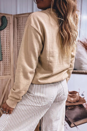 65% polyester, 35% cotton Care instructions: Machine wash cold sweatshirt in beige with relaxed silhouette