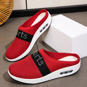 Red mesh sportswear mules with air cushion and black embellished band