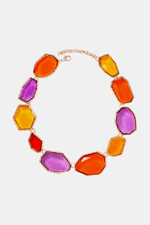 Prismatic resin stone collar necklace with multicolor faceted stones and gold alloy chain.