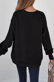 Black sweatshirt featuring drop shoulder and geometric