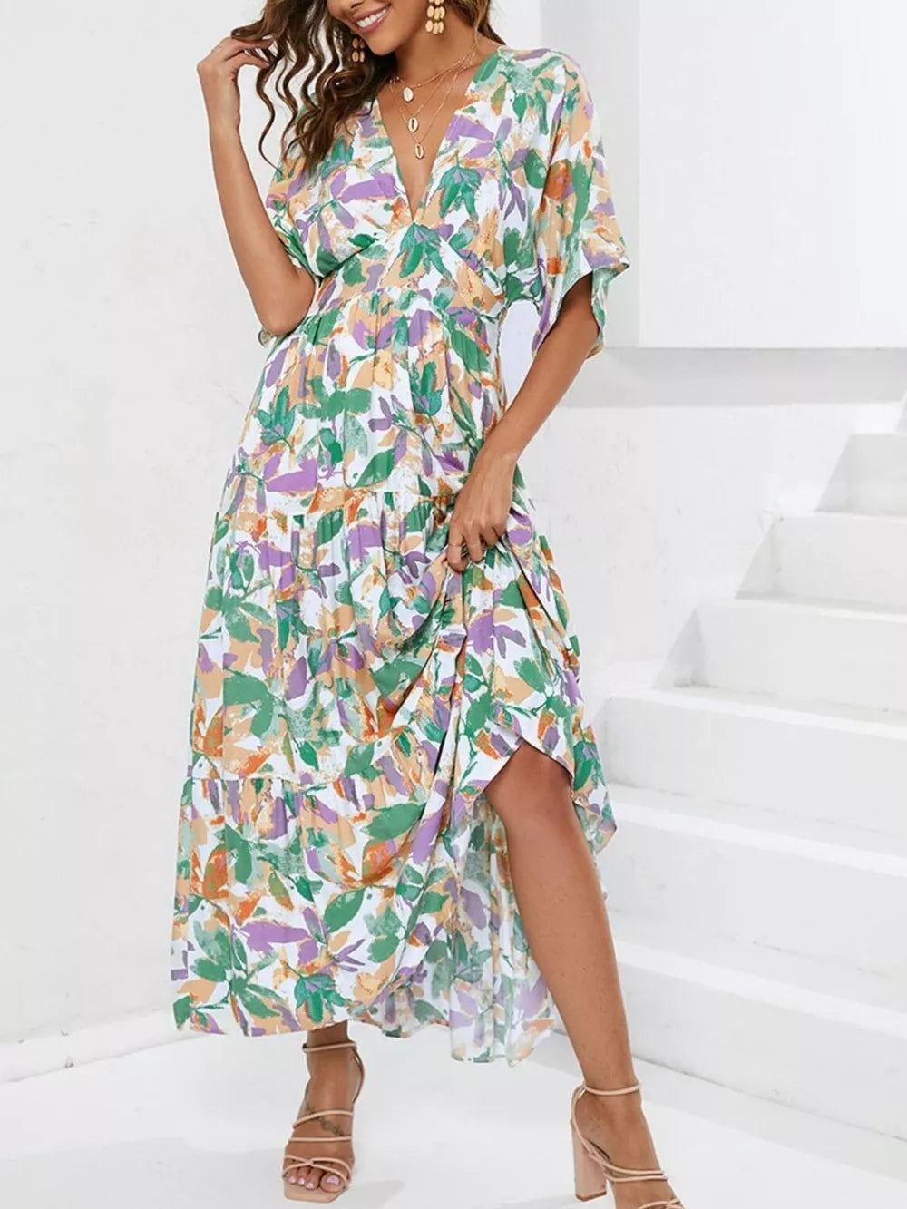 Lemon Leaf Print V-neck Midi Dress in Black Forest with short sleeves and tiered skirt.