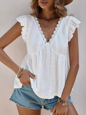 White eyelet blouse with lace trim and ruffle sleeves, V-neck.