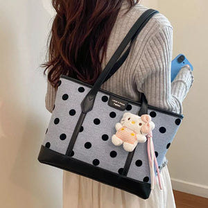 handbag in Blue with polka dot and top handles