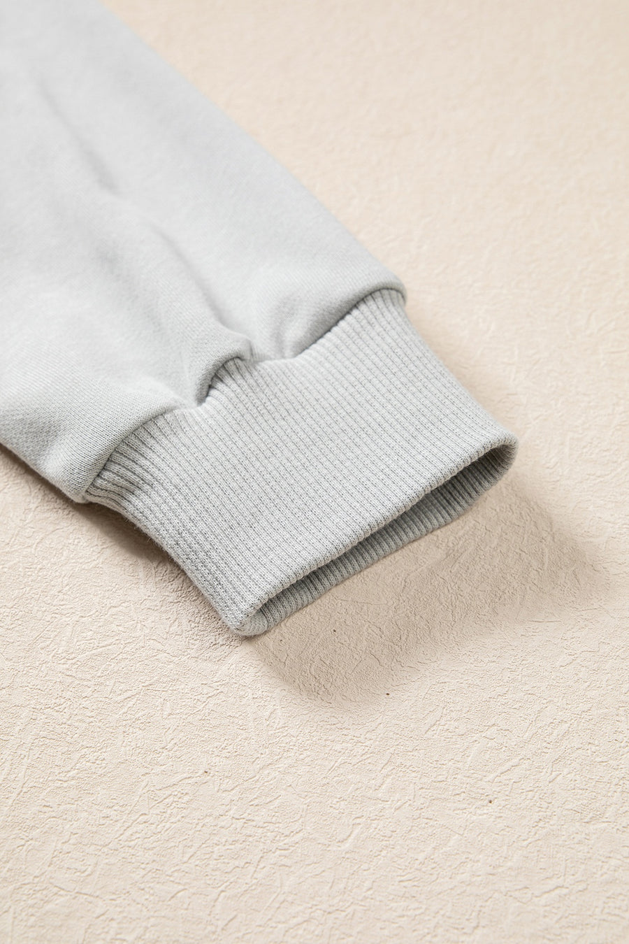 light grey relaxed pullover sweater with crew neck