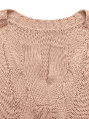 Pink acrylic cable knit sweater vest with V-neck and ribbed trim.