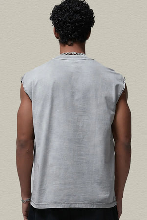 Washed cotton cut-off tank top in gray with raw edges and a relaxed fit.