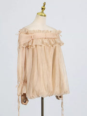Romantic off-shoulder ruffled blouse in champagne color with tie details