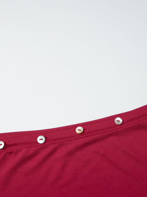 Red fitted one-shoulder t-shirt with pearl button detail