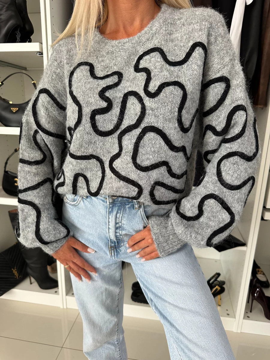 pullover sweater featuring abstract in black with 100% polyester Care instructions: Machine wash cold texture