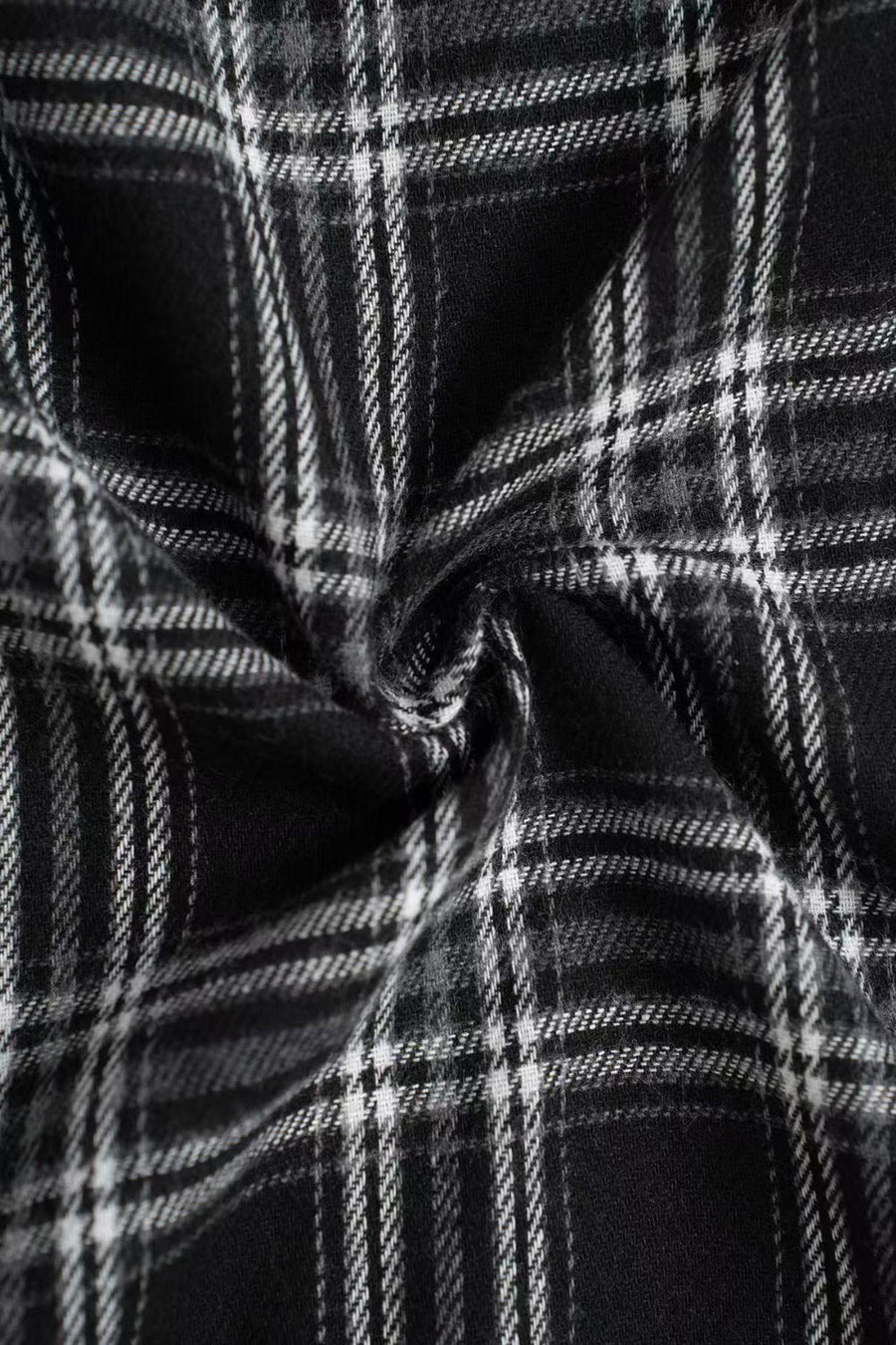 Black plaid palazzo lounge trousers with a soft, brushed texture.