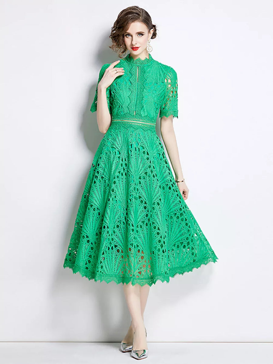 Green lace midi dress with delicate sleeves and a-line skirt.