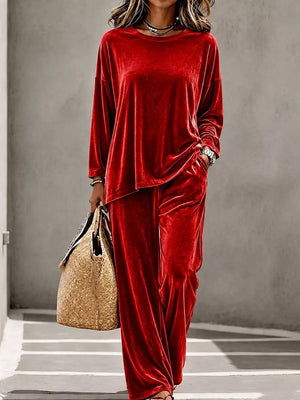 top and pants set in red featuring ruched and relaxed fit