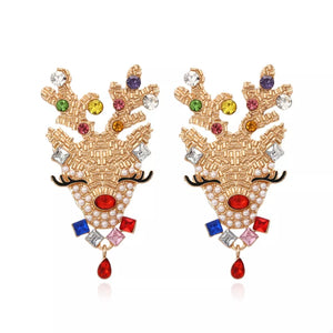 earrings in gold featuring rhinestone embellishment and drop fit