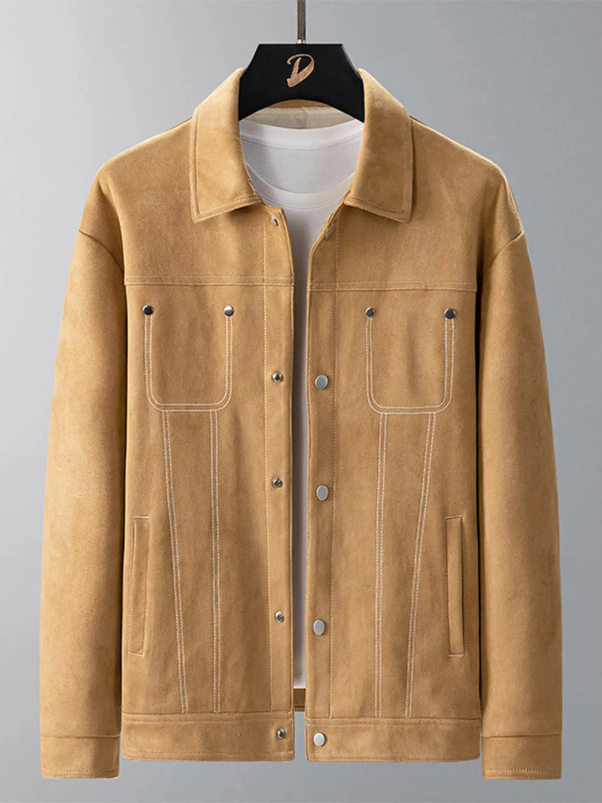 Caramel trucker jacket with white contrast stitching and snap buttons.