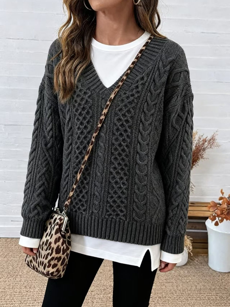 100% polyester Care instructions: Machine wash cold pullover sweater in Off-white with relaxed silhouette