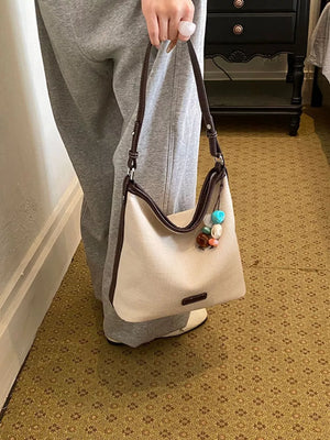 Casual Shoulder Bag With Charm in ivory with decorative charm
