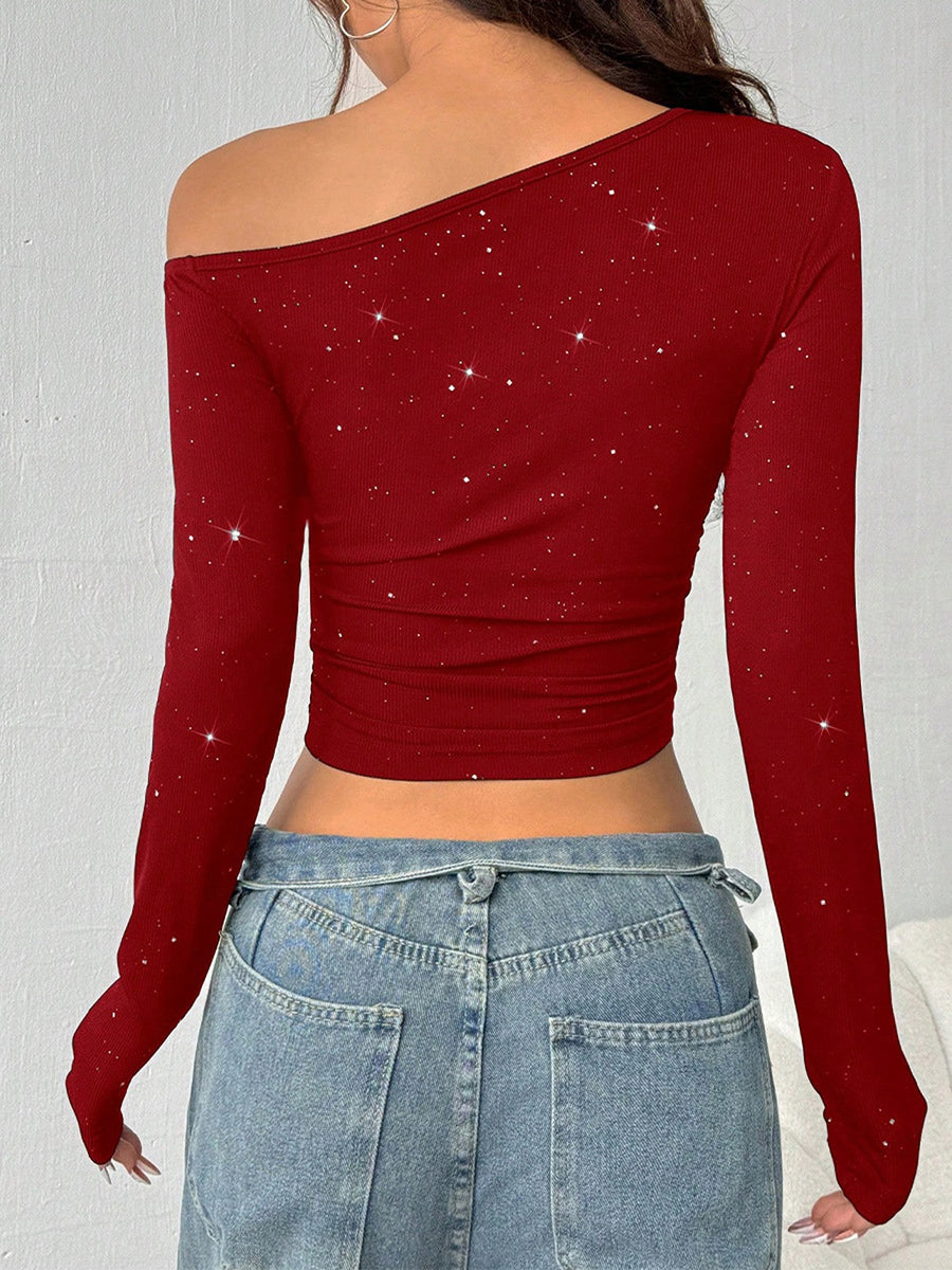 one-shoulder top in black with glitter and cropped