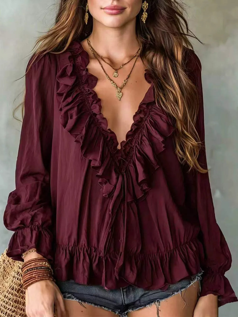 white blouse with v-neck and long sleeve