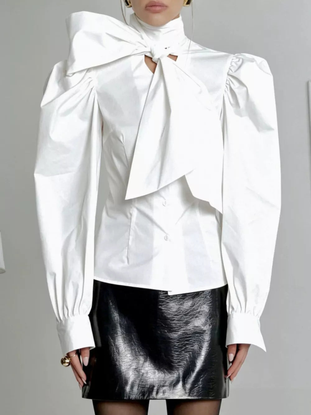 blouse in optic white featuring bow and fitted fit
