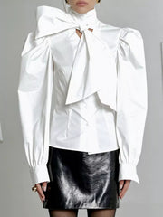 blouse in optic white featuring bow and fitted fit