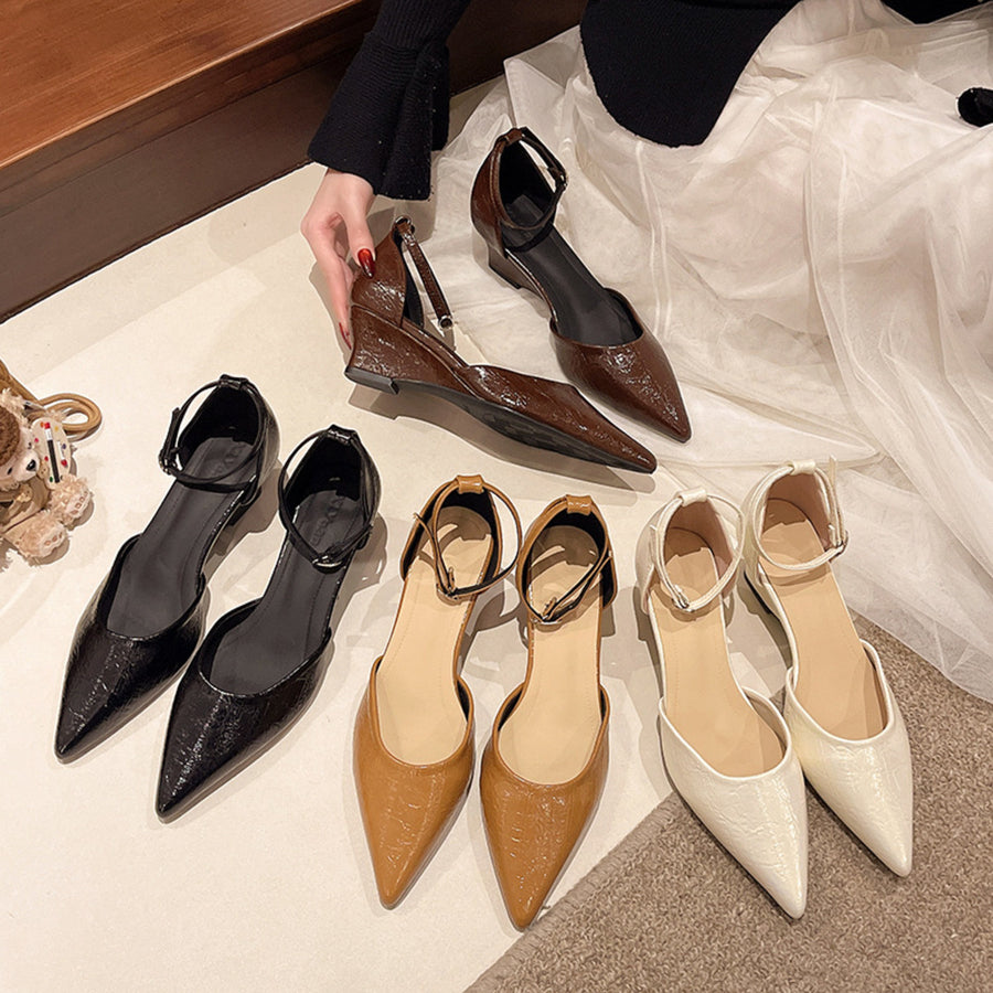 Pointed-toe ankle strap shoes with adjustable buckle in black, brown, beige, and yellow.