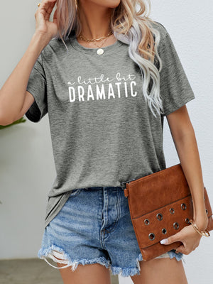 Heather gray crew neck tee with white "a little bit DRAMATIC" graphic text.