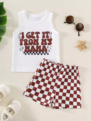 Baby girl's white graphic tank top and brown checkered shorts set.