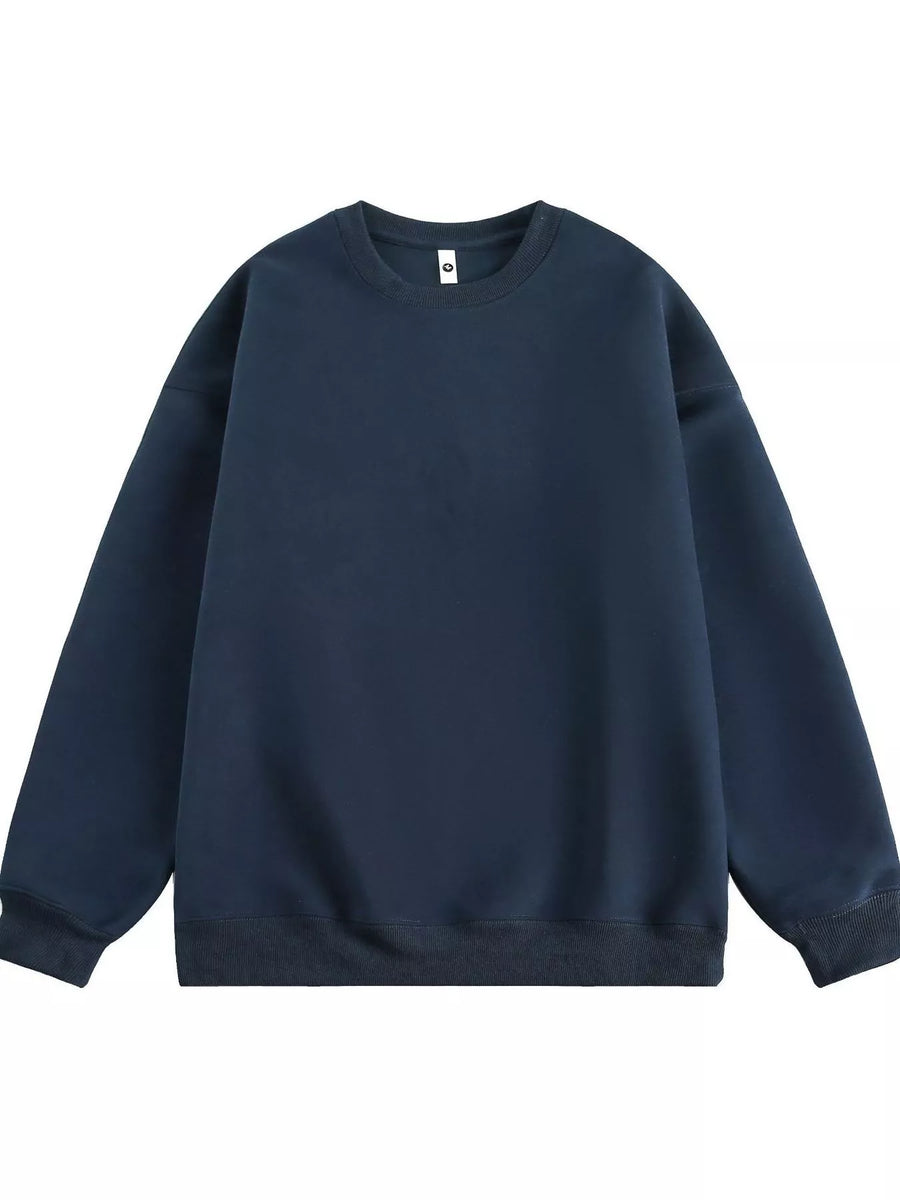 Navy blue oversized crew-neck sweatshirt with ribbed cuffs and hem.