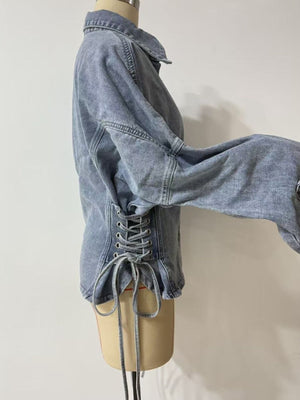 denim jacket in light blue with buttoned and hip-length