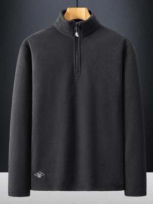 Dark Gray quarter zip sweatshirt with a mock neck and subtle logo detail.