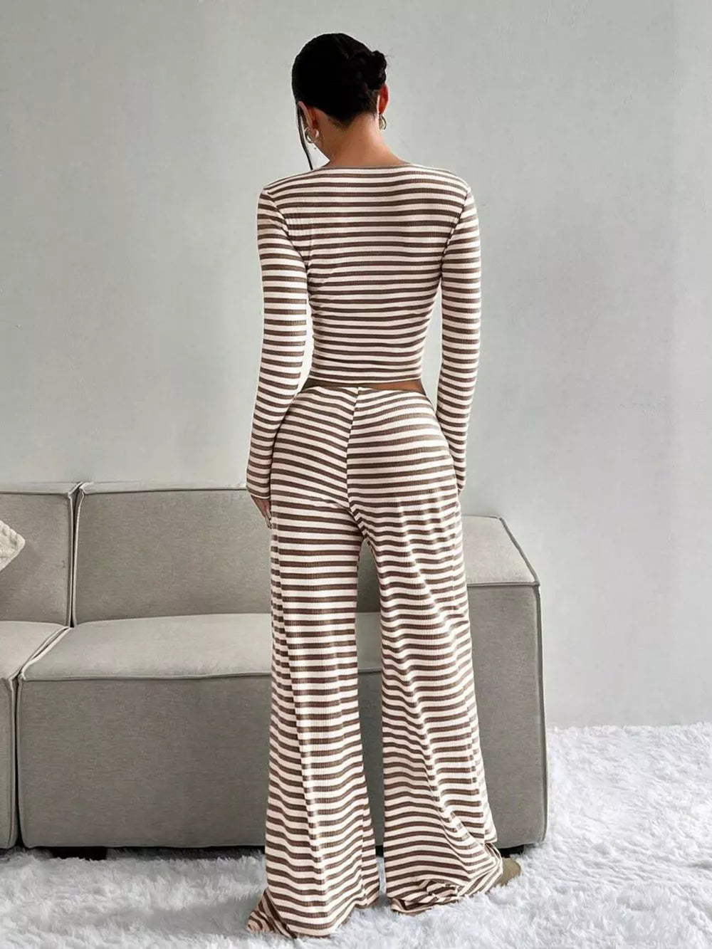 Striped crop top and wide-leg pants loungewear set in brown and white.