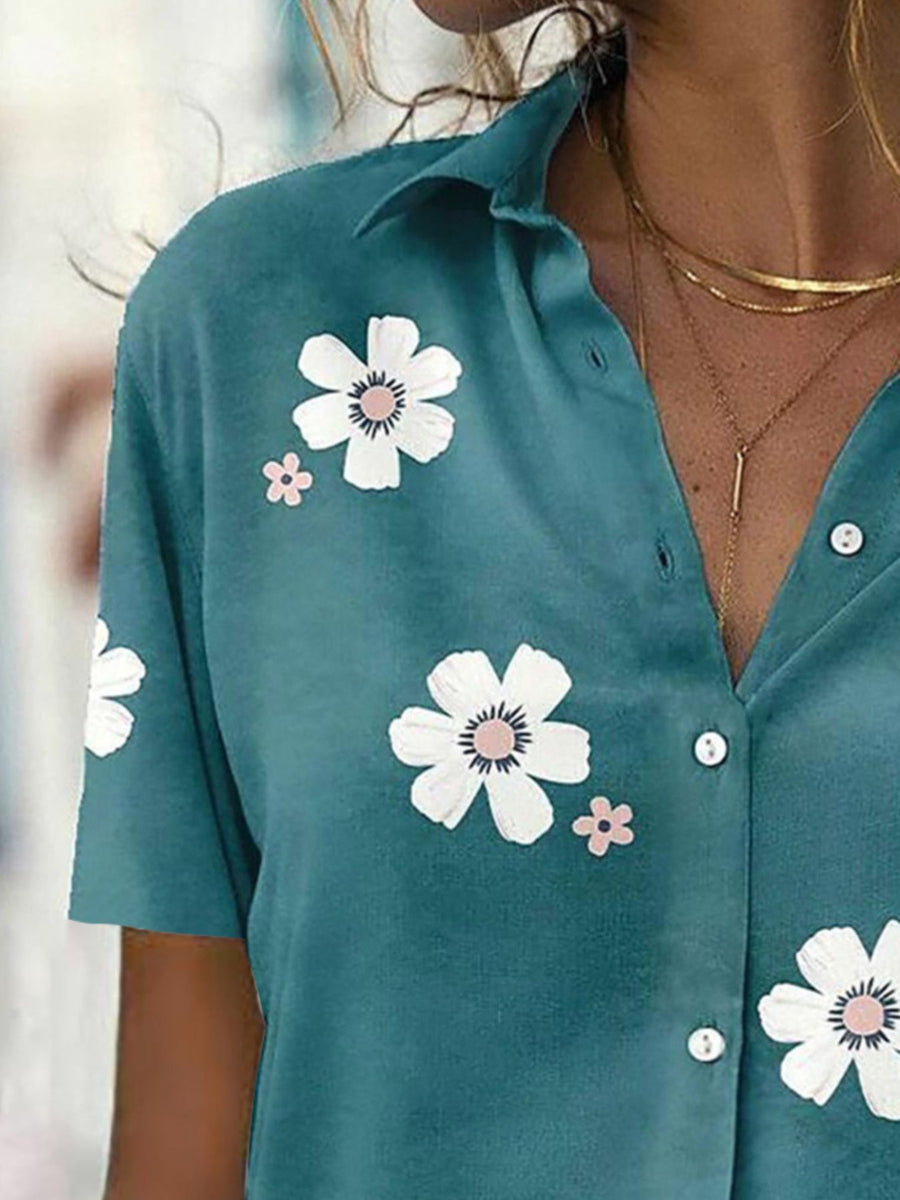 button-down shirt featuring floral in white with 100% polyester Care instructions: Machine wash cold texture