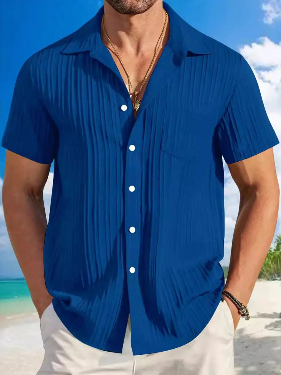 Royal Blue textured pleated resort shirt with short sleeves and a button-up front.